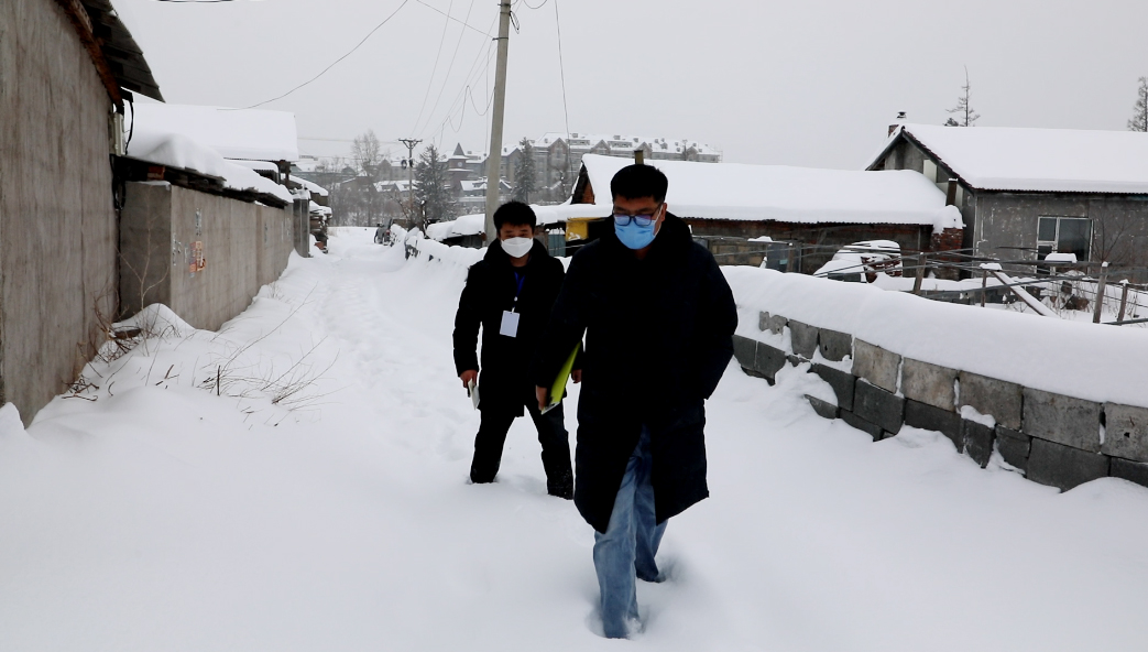 长白山防疫在行动|防疫剪影：池北区战“疫”者冒雪前行