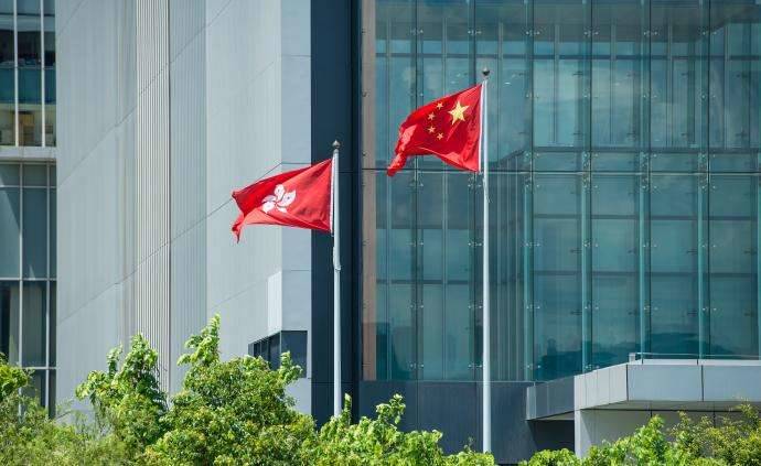 维护“一国两制”下的美丽香港——港区代表委员谈全国人大涉港决定草案