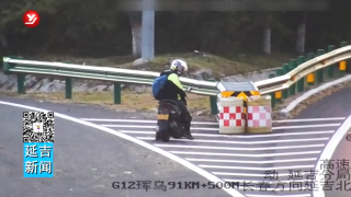 重庆小伙骑车游东北　高速停车被处罚