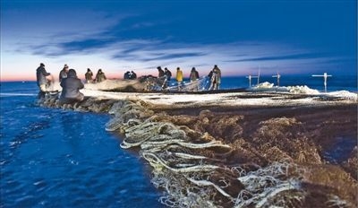 人民日报关注：查干湖上喜开渔