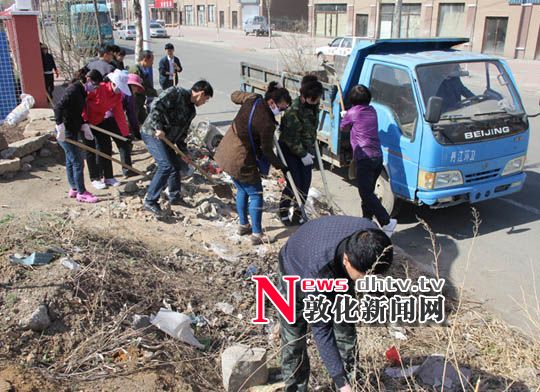 江滨社区与检察院组织在职党员开展环境卫生整治